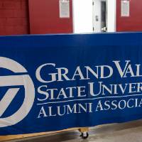 Sign that says Grand Valley State University Alumni Association at the Fowling Fun Event